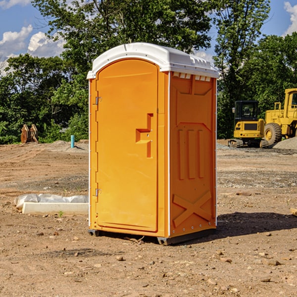 how often are the portable restrooms cleaned and serviced during a rental period in Okeene